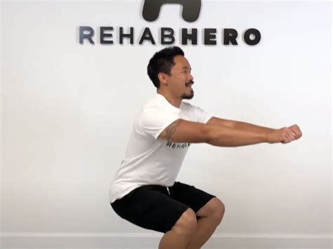 Narrow Stance Heel Elevated Squat — Rehab Hero