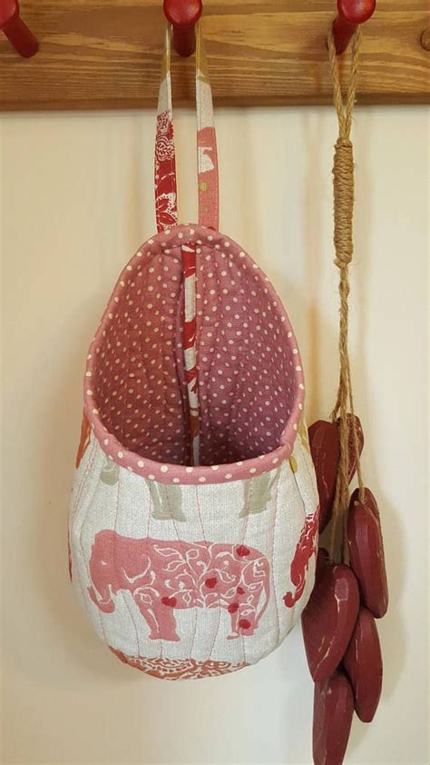 You simply need to choose your fabric or theme and choose your favorite pattern. Hanging Fabric Storage Pod Baskets, Pod Storage, Crafting ...