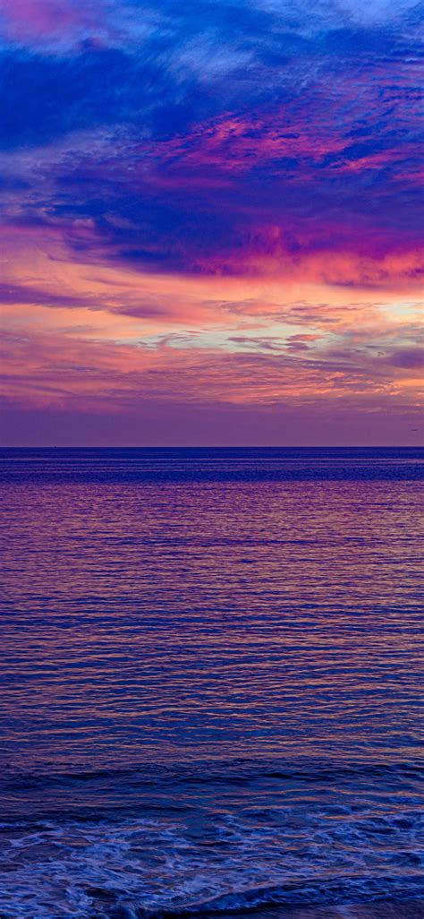 1125x2436 Pink Sunset Seascape Calm And Beautiful