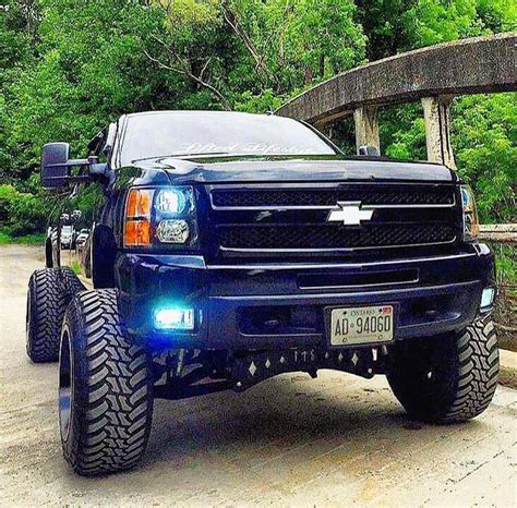 Yup love jacked up trucks i want either a jacked up chevy or jeep wrangler.decisions decisions.we already have a jacked up ford what fun is it to. jacked up chevy trucks pictures #Jackeduptrucks in 2020 ...