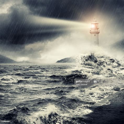 Composite Image Of A Lighthouse Beacon Shining With Stormy Weather Lighthouse Pictures