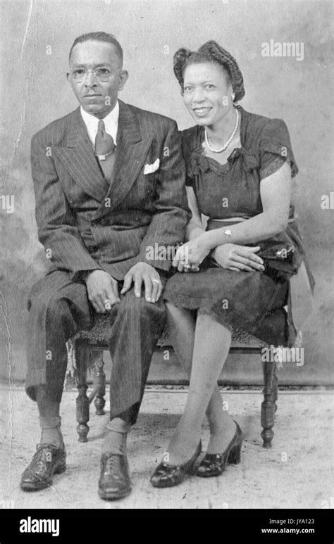 Portrait Of African American Couple Wearing Suit And Formal Dress In