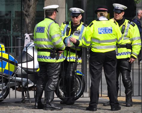 Experts question whether more British police should carry guns after deadly terror attacks ...