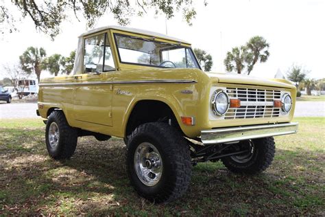 1969 Half Cab Bronco With A Clean Empire Yellow Paintjob
