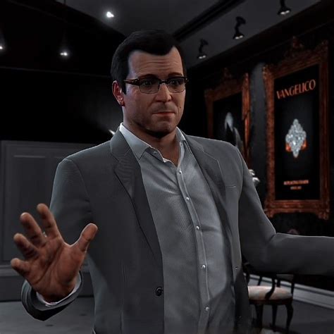A Man In A Suit And Glasses Holding Out His Hands