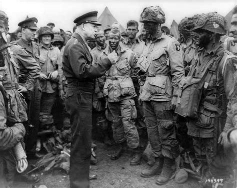 American wwii army combat soldiers (101st airborne division) with mohawk style haircuts paint each others faces with face paint on the eve of their jump on this day, 75 years ago, general dwight d. US Airborne Troops with Mohawk Haircuts - Armchair General ...