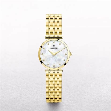 ladies michel herbelin epsilon gold plated watch with a mother of pearl dial