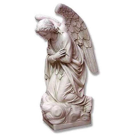 This Kneeling Angel Statue Has A Look Of Tranquility On Her Face Hand