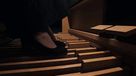 Young Woman Playing Electronic Organ Pedals With Her Feet Stock Video