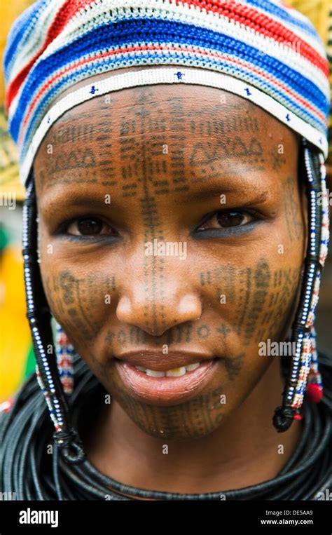 Portrait Of A Peul Fulani Woman Covered With Traditional Facial