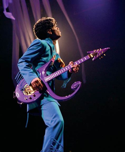 Prince Onstage Playing Purple Guitar Looking Away Toronto 2004