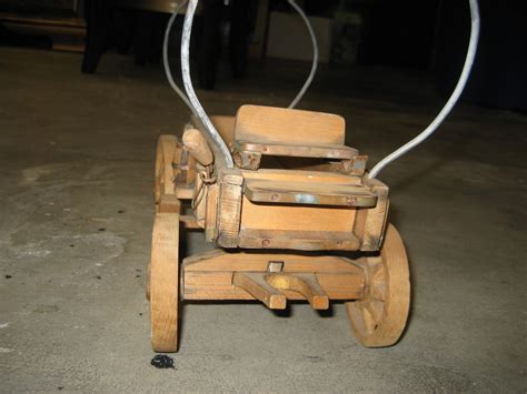 The wheels come from a previous project. vintage handmade wooden wagon toy | Collectors Weekly