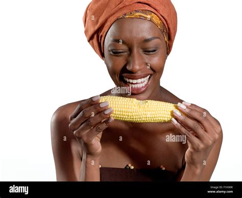 African Woman Eating Corn On The Cob Stock Photo Alamy