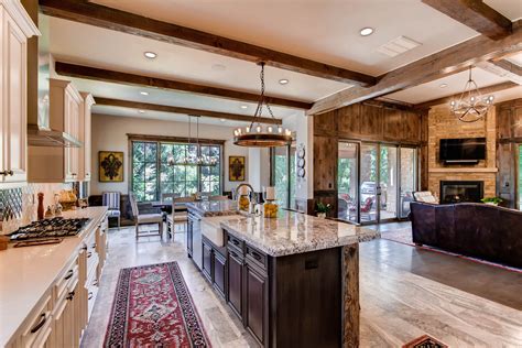 Rustic Open Floor Plan Kitchen And Living Room With Old World Charm