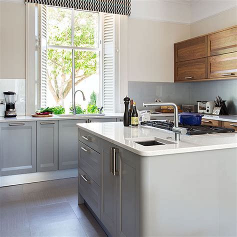Walnut and white gloss kitchen. Pale grey kitchen with walnut units | Decorating | Ideal Home