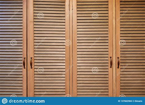 Rustic Brown Wooden Window Shutters Wall Background Stock Photo