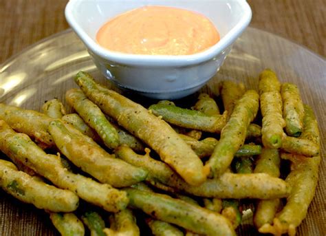 I can remember the first time i ordered the fries as an appetizer…man, were they good! Fried Green Beans with Spicy Dipping Sauce