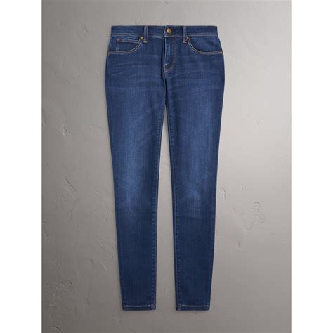 Skinny Fit Low Rise Power Stretch Jeans In Mid Indigo Women