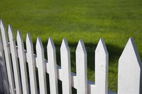White Picket Fence With Green Grass Background Sponsored Fence