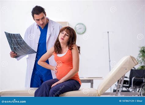 Pregnant Woman Visiting Male Doctor Gynecologist Stock Image Image Of Physician Gynecologist