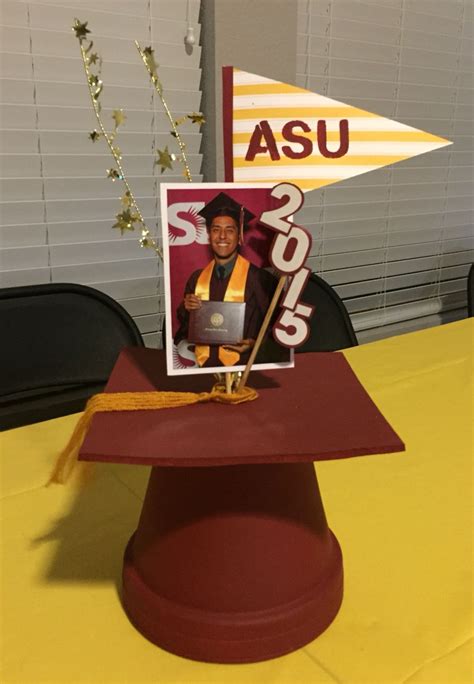 Get your raiders apparel from maroon and white. Image result for Maroon and Gold centerpieces | Graduation ...