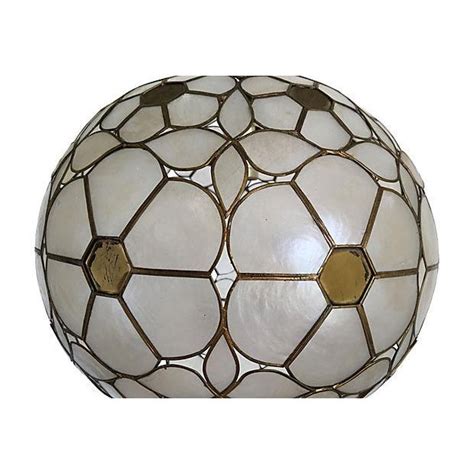 Maybe you would like to learn more about one of these? Mid Century Capiz Globe Pendant Light | Chairish