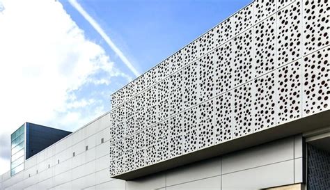 Perforated Aluminum Panel Curtain Wall Adds Texture To The Facade Of