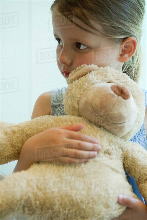 Little Girl Hugging Teddy Bear Stock Photo Dissolve