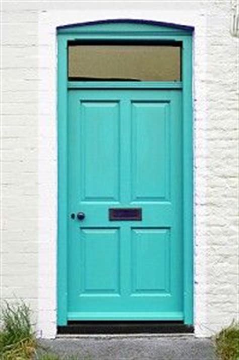 A shiny window with blinds and shutters is beside the door. 23 best images about Front Door / Aqua Paint Colors on Pinterest | Blue shutters, Teal and On ...