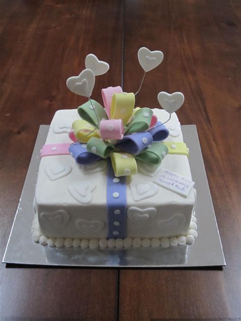 Buy unique gift hamper of flowers & cakes, chocolate, teddy online at low cost for same day delivery. Gift box cake with fondant bow Fondant bow Fondant-bow ...