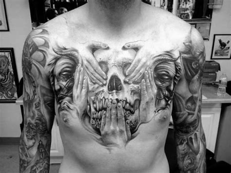 The tattoos are meant for both the genders. 50 Skull Chest Tattoo Designs For Men - Haunting Ink Ideas