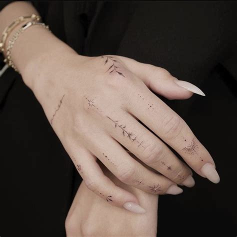 Dainty Fine Line Hand Tattoo Hand Tattoos For Girls Hand And Finger