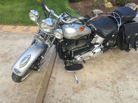 I bought this bike from the drug enforcement agency in 05 with 350 miles and have only put 100 miles a year on it since. 2003 Harley Davidson 100th Anniversary Heritage Softail ...