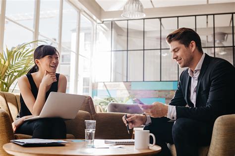Click this link and we will adjust those browser settings for you. Business Professional Meeting In Lobby Of Modern Office ...