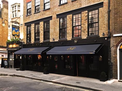 Coastal canvas and awning company was established in 1984. Victorian awnings for Mimi's Hotel | Morco Blinds