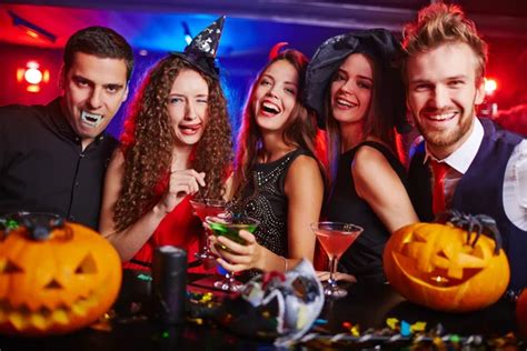 Disguised People Celebrating Halloween — Stock Photo © Pressmaster