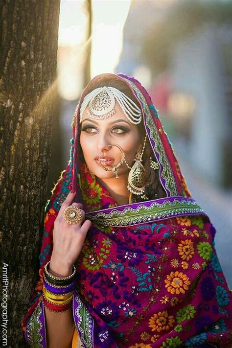 Absolutely Stunnning Bride In A Rainbow Shaded Dupatta And Silver Jewelry Pakistan Fashion