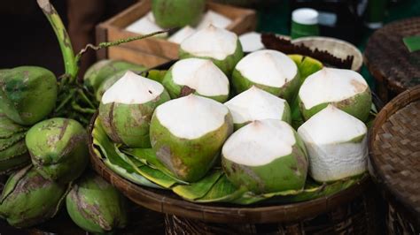 Premium Photo Fresh Coconuts In The Asian Market