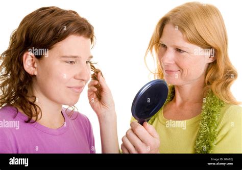 Mother And Daughter With Mirror Stock Photo Alamy