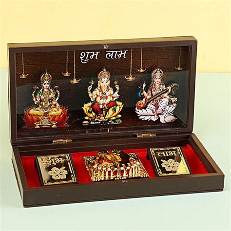 Buysend Diwali Pooja Box And Dairy Milk Miniatures Online Ferns N Petals