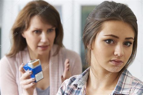 Mother Talking To Teenage Daughter About Dangers Of Smoking — Stock