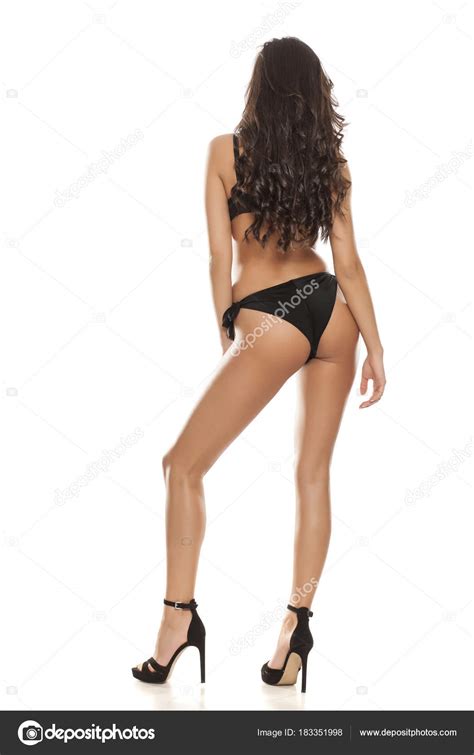 Rückansicht Eines Models Schwarzen Bikini Das Auf Weißem Hintergrund Posiert Stockfotografie