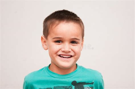 Portrait Of Cute Four Year Old Boy With Short Haircut