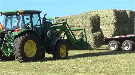 Loading And Hauling Large Square Bales With A John Deere 5085m And 6300