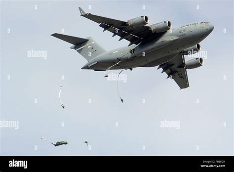 Paratroopers Jump From A Us Air Force C 17 Globemaster Iii Stock