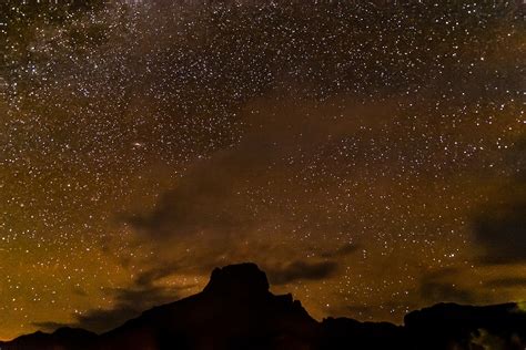 A Starry Sky Over The Chisos Mountains In Big Bend National Park Texas