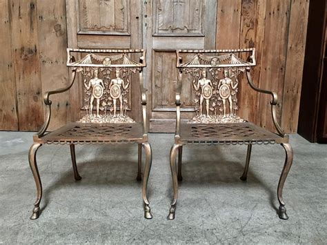 Outdoor patio furniture for sale. Pair of Romanesque Garden Chairs For Sale at 1stdibs