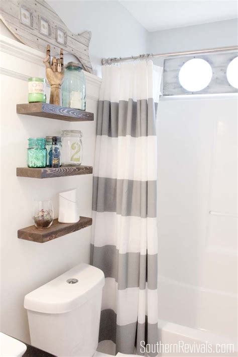 Towel racks are a bathroom necessity, but hanging one on a vanity can make it look cluttered. Over The Toilet Storage And Design Options For Small Bathrooms