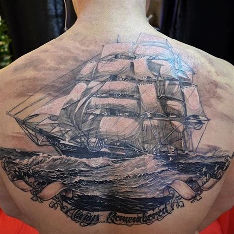 Breathtaking Very Detailed Upper Back Tattoo Of Big Sailing Ship With