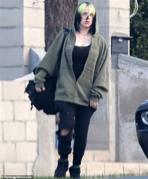 Everyone was more worried about that tank photo than billie eilish. Billie Eilish is seen in a tank top as she hugs her ...